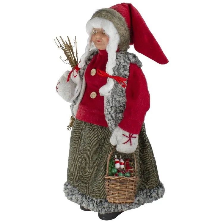 18" Mrs. Clause Carrying a Basket of Gifts and Firewood Christmas Figurine