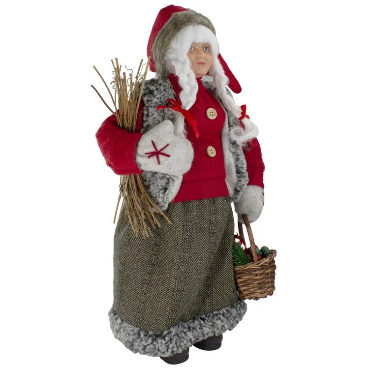 18" Mrs. Clause Carrying a Basket of Gifts and Firewood Christmas Figurine