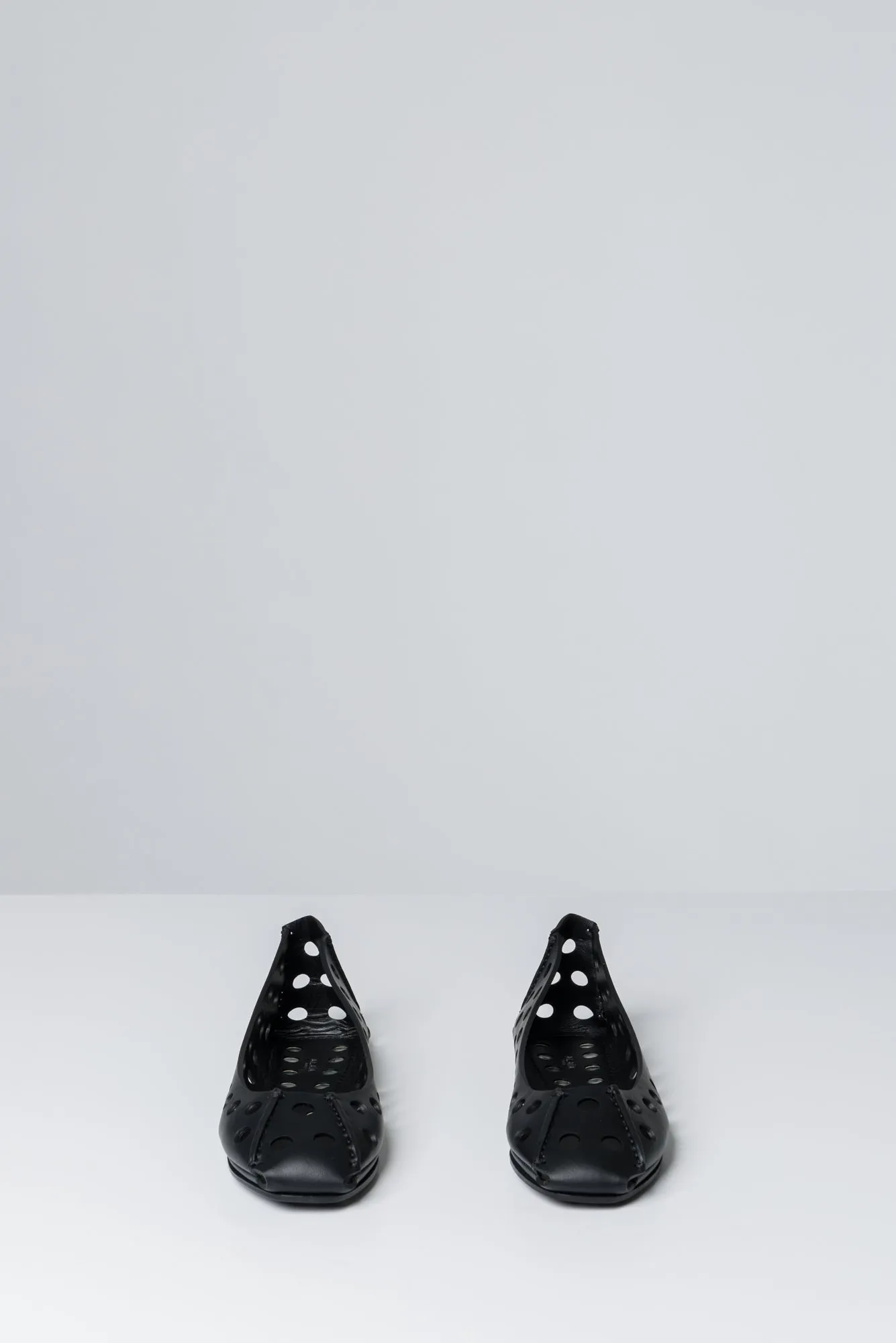 Alaïa Perforated Ballet Flats in Black