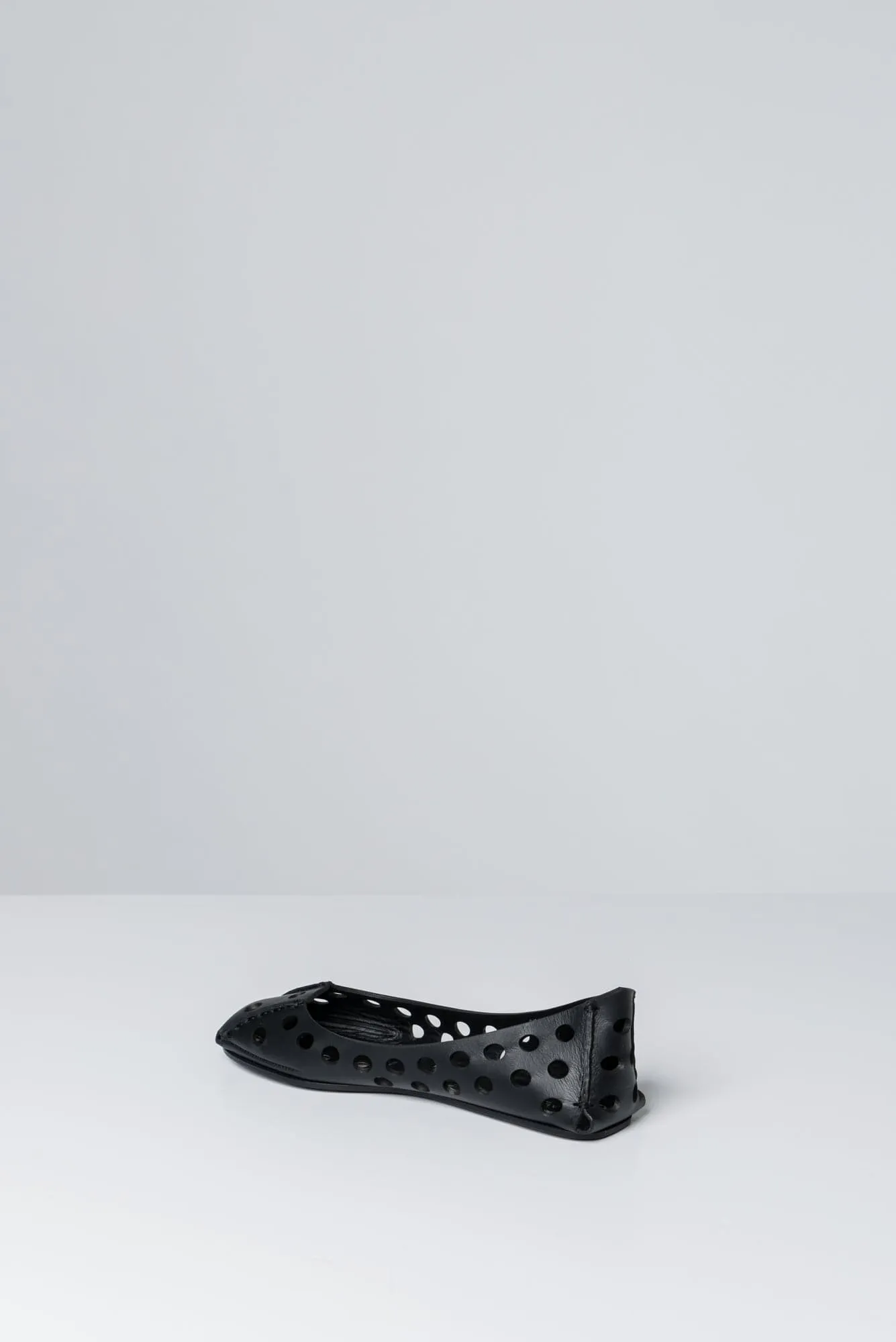 Alaïa Perforated Ballet Flats in Black
