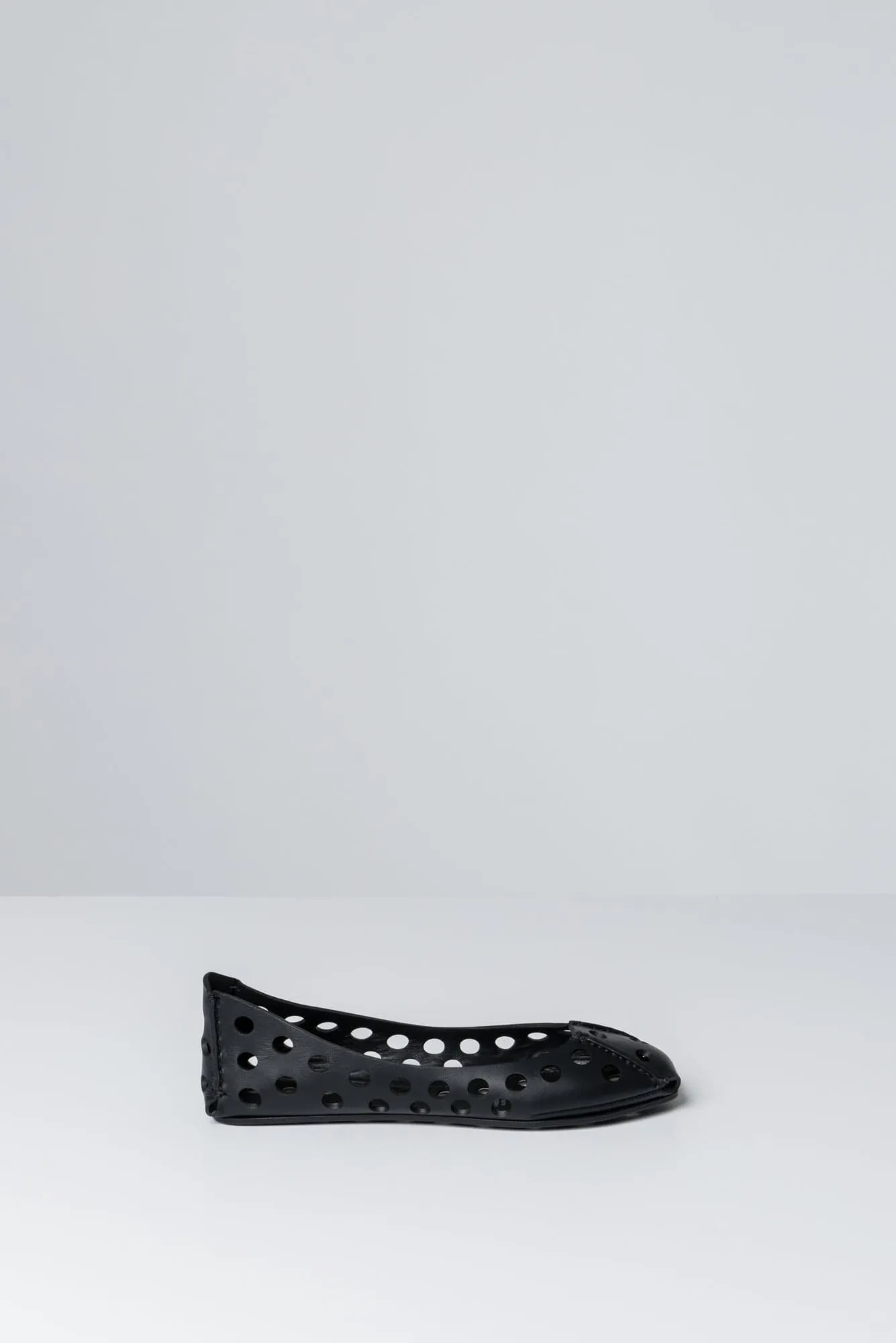Alaïa Perforated Ballet Flats in Black